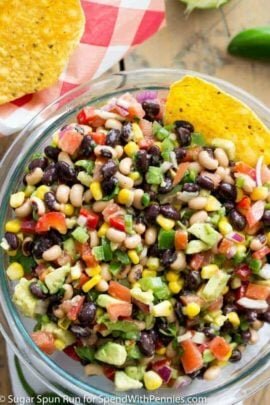 Cowboy Caviar in a glass bowl with tortilla chips