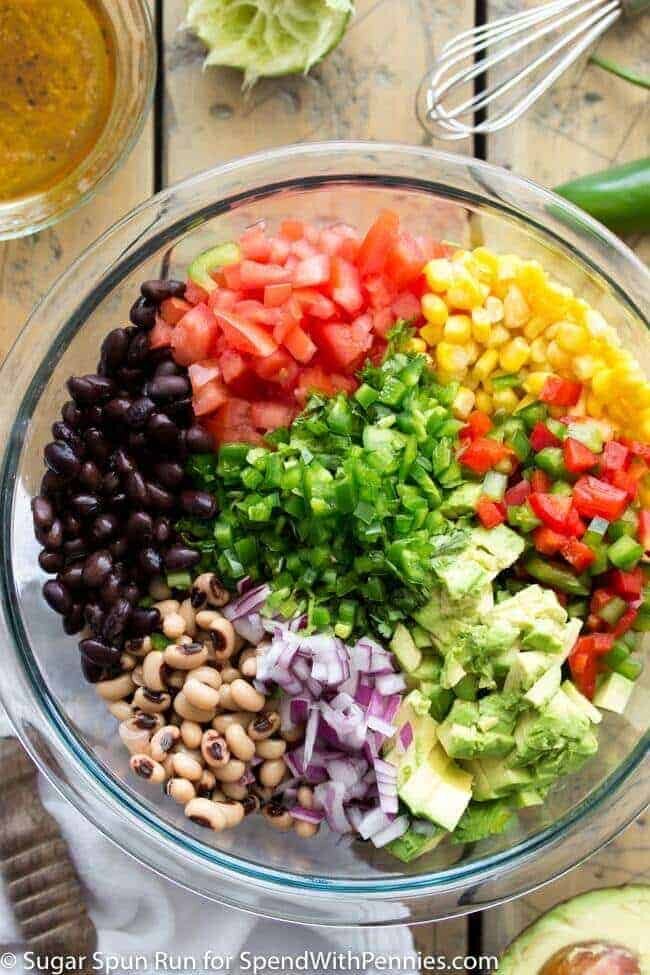 Ingredients for cowboy caviar in a glass bowl