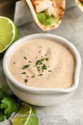 easy Fish Taco Sauce in a bowl with garnish